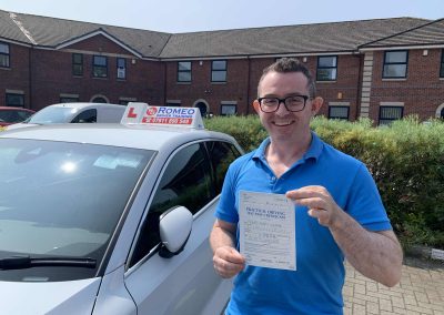 Richard Angus after passing their driving test with Romeo Driver Training, Chester